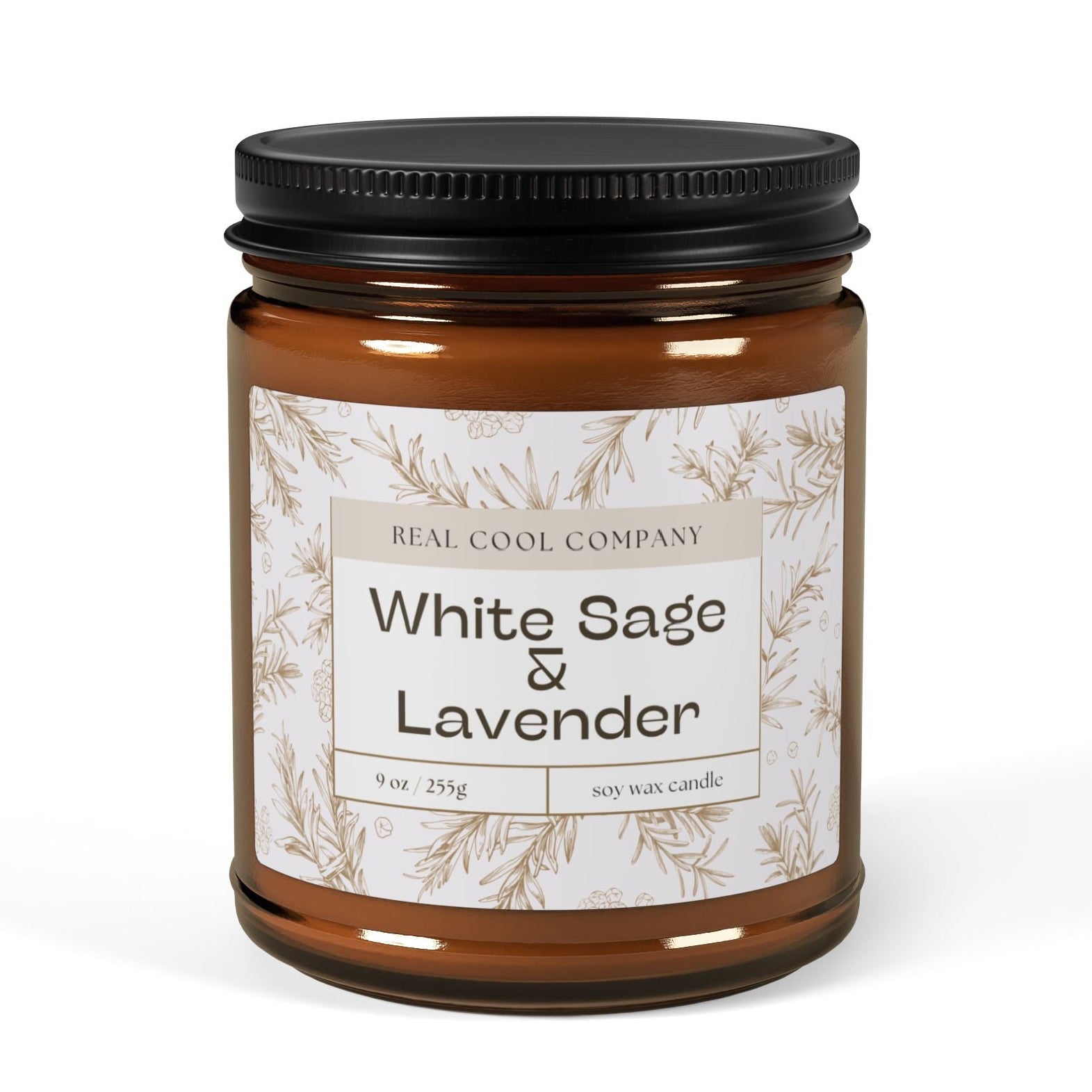 A 9oz amber glass jar candle with a black metal lid and a white paper label reading 'White Sage & Lavender' by Real Cool Company,