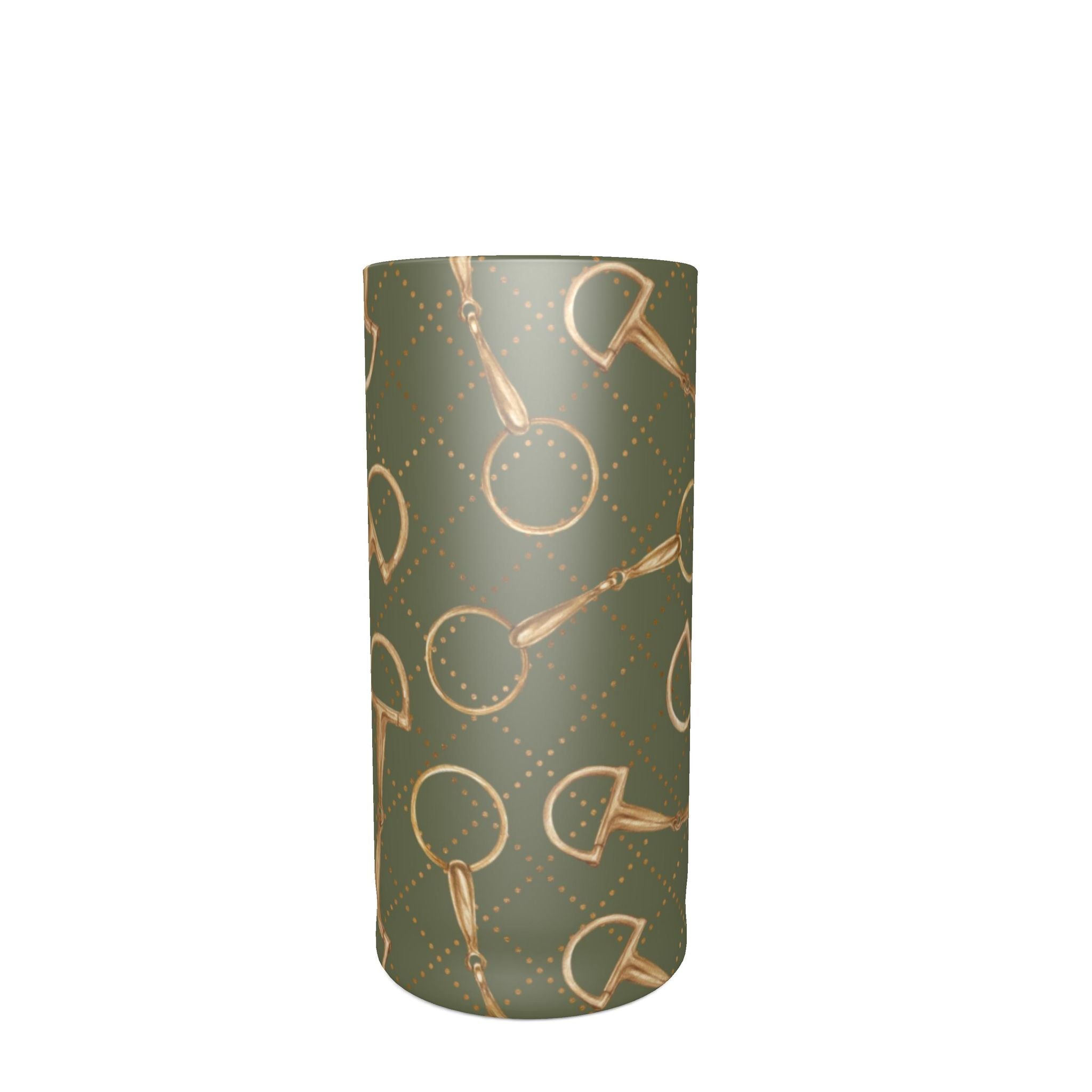A tall, cylindrical shot glass with a muted sage green background and a repeating metallic gold pattern of horse bits and dotted diamond shapes, shown against a plain white background.