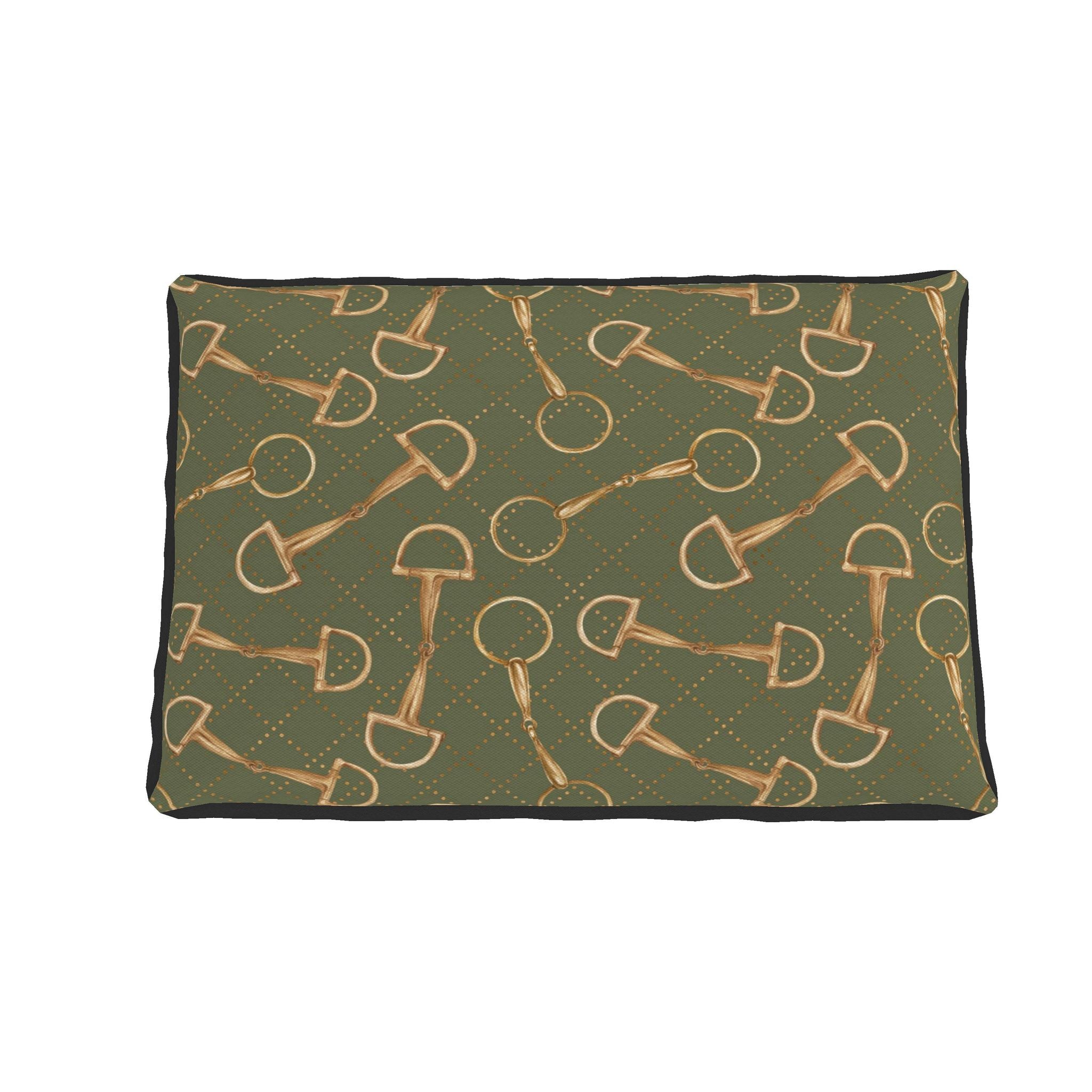 A rectangular pet bed with a dark olive green background featuring a repeating pattern of gold horse bits and small gold dotted lines, finished with a black stitched border.