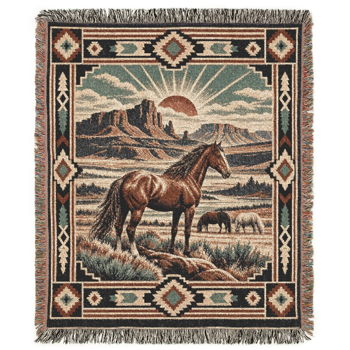 A woven throw blanket with fringe, featuring a western landscape scene with a brown horse in the foreground, another horse in the background, desert mountains, and a sunburst motif, surrounded by a Southwestern geometric border.