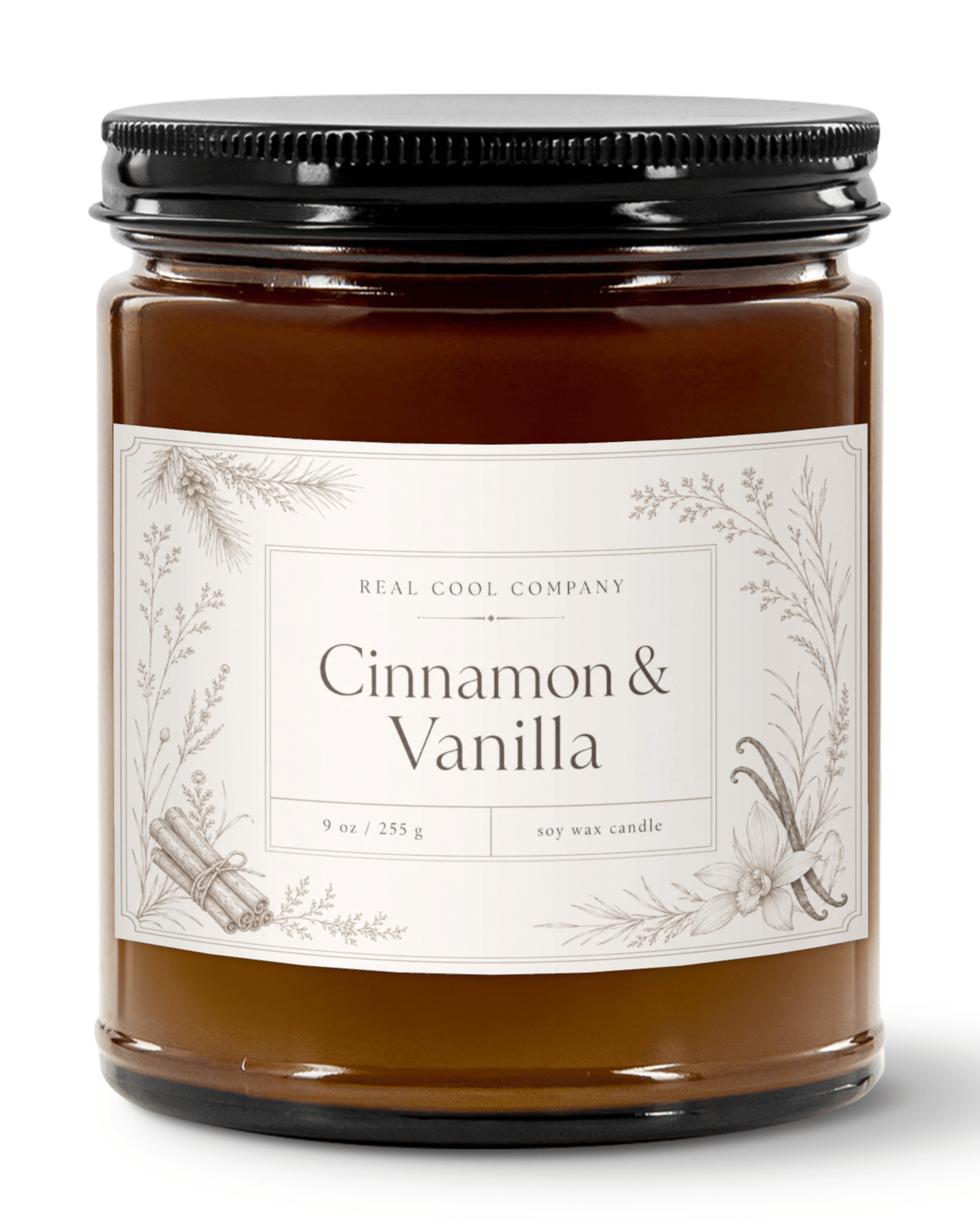 An amber candle jar, a black metal lid, and a cream label reading 'REAL COOL COMPANY Cinnamon & Vanilla' with botanical illustrations.