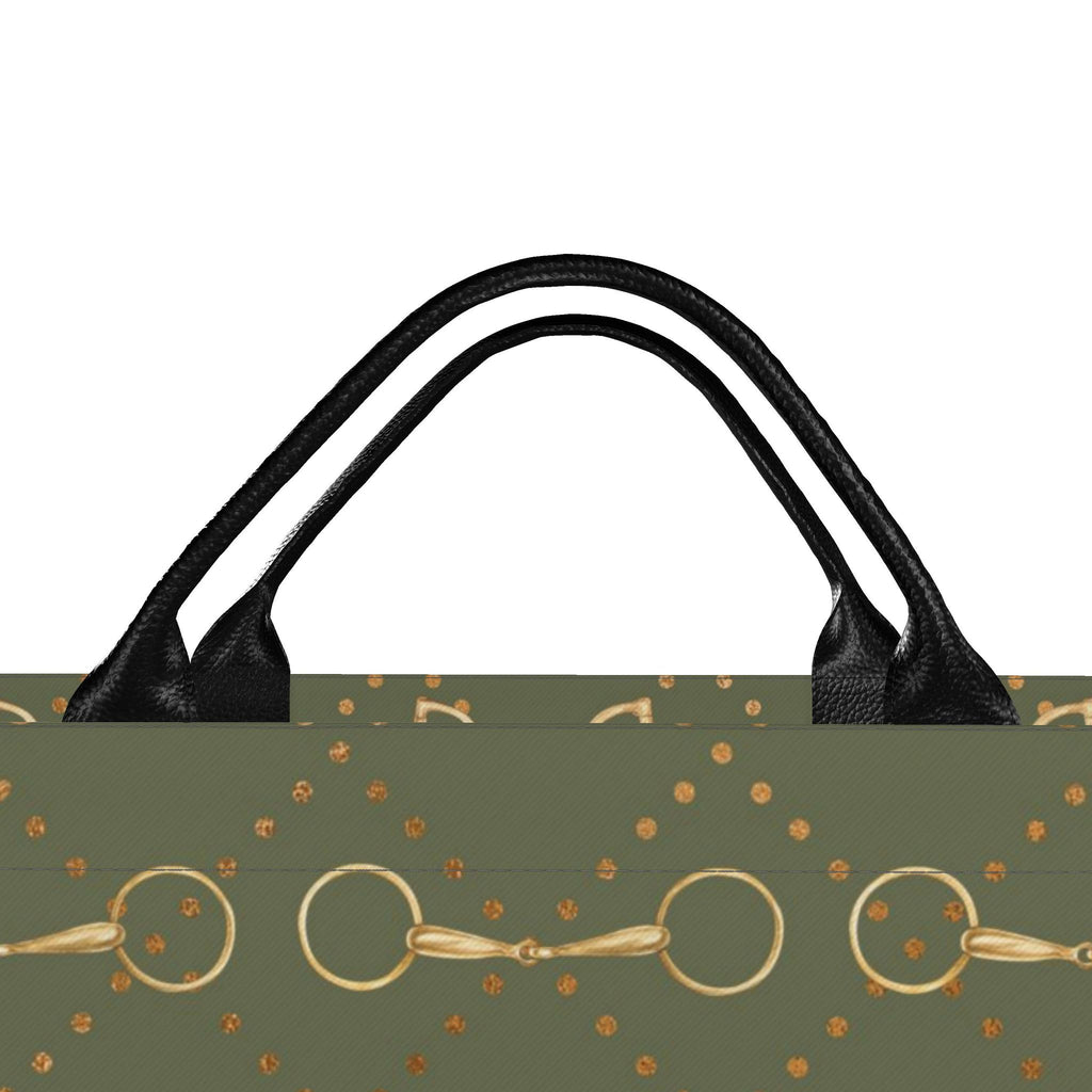 An olive green tote bag with black double leather shoulder straps, featuring a gold horse bit and gold dot pattern on a white background.