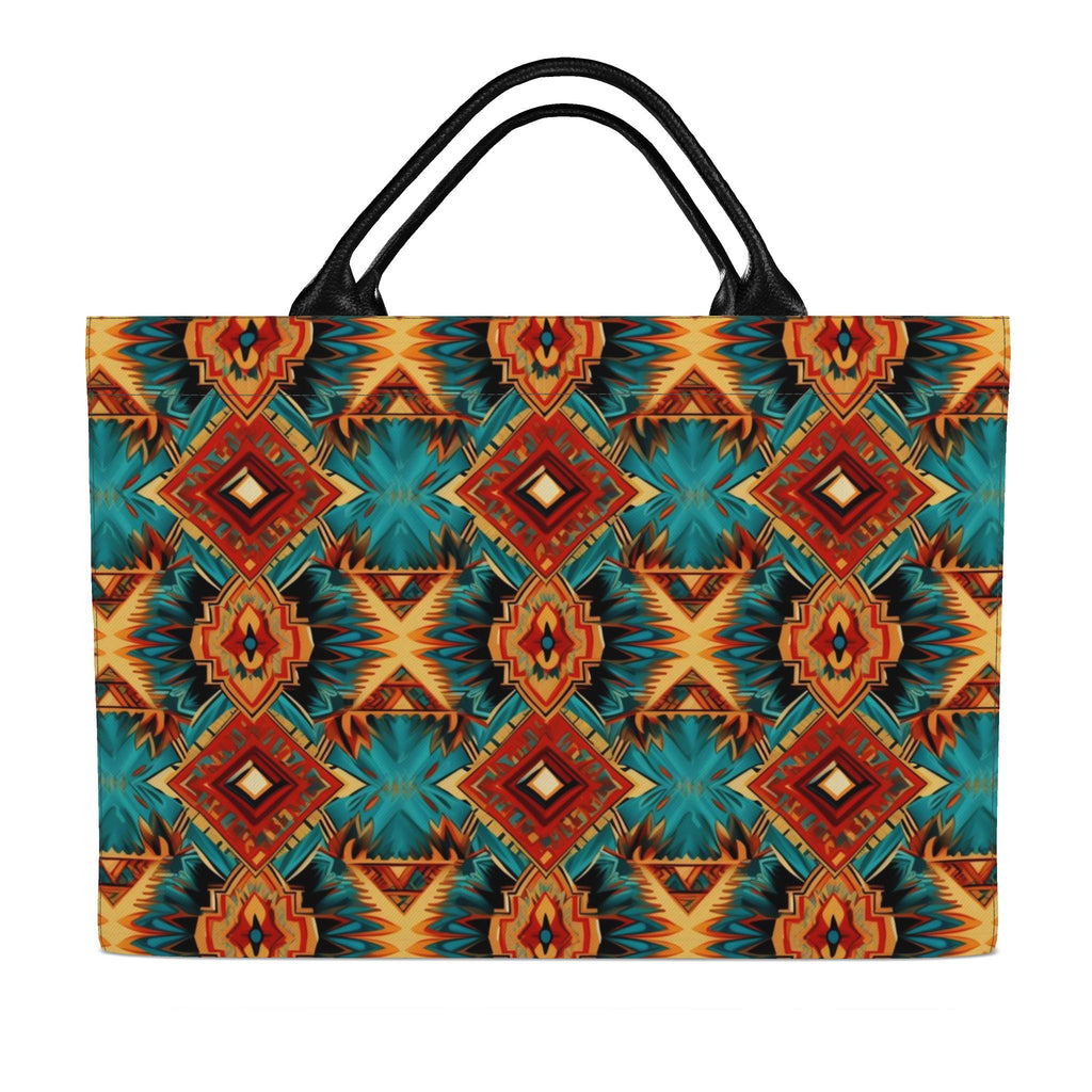 back side tote bag with a vibrant Southwestern geometric pattern in teal, orange, red, and black, featuring dual black shoulder straps, shown against a plain white background.